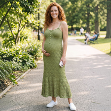 Load image into Gallery viewer, Aurora Boutique Miami Samira crochet maxi dress in olive green with V-neck and button front worn by a pregnant model