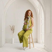 Load image into Gallery viewer, Aurora Boutique Miami Adora Tencel jumpsuit in olive green worn by a pregnant model with a floral scarf