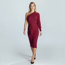 Load image into Gallery viewer, Model wearing a burgundy Aurora Boutique Miami one-shoulder long sleeve knit midi dress with a matching waist tie.
