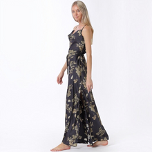 Load image into Gallery viewer, Aurora Boutique Miami Candelaria maxi dress with cowl neck, floral print, and belted waist on a blonde model
