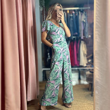 Load image into Gallery viewer, Aurora Boutique Miami Cite floral jumpsuit with short flutter sleeves and wide legs in green and purple palm print
