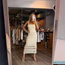 Load image into Gallery viewer, Aurora Boutique Miami Lua crochet maxi dress in cream with square neckline and open weave panels worn by a model

