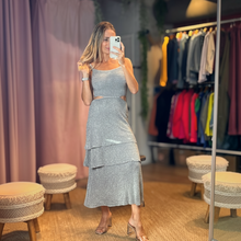Load image into Gallery viewer, Aurora Boutique Miami Paulina lurex crochet midi dress with side cutouts worn by a model in a boutique dressing room
