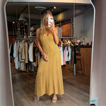 Load image into Gallery viewer, Aurora Boutique Miami Lais crochet maxi dress in mustard yellow with V-neckline worn by a blonde model in a mirror
