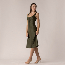 Load image into Gallery viewer, Aurora Boutique Miami Terese satin midi dress in olive green with a lace-up front detail worn by a model

