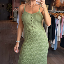 Load image into Gallery viewer, Aurora Boutique Miami Samira crochet maxi dress in sage green with button-front bodice and slim straps on a model
