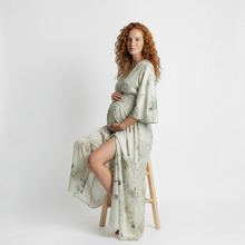 Load image into Gallery viewer, Aurora Boutique Miami Saravena maxi dress with kimono sleeves and tie back on a pregnant model sitting on a stool
