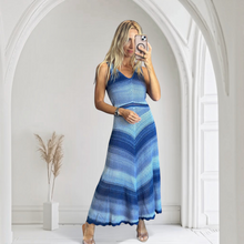 Load image into Gallery viewer, Aurora Boutique Miami Sueli crochet dress with blue gradient ombré stripes, V-neckline, and flowing midi silhouette.

