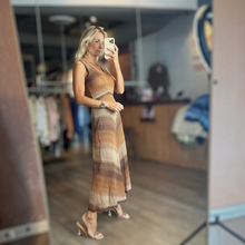 Load image into Gallery viewer, Aurora Boutique Miami Sueli crochet dress with V-neck and brown ombré gradient stripes worn by a model in a mirror
